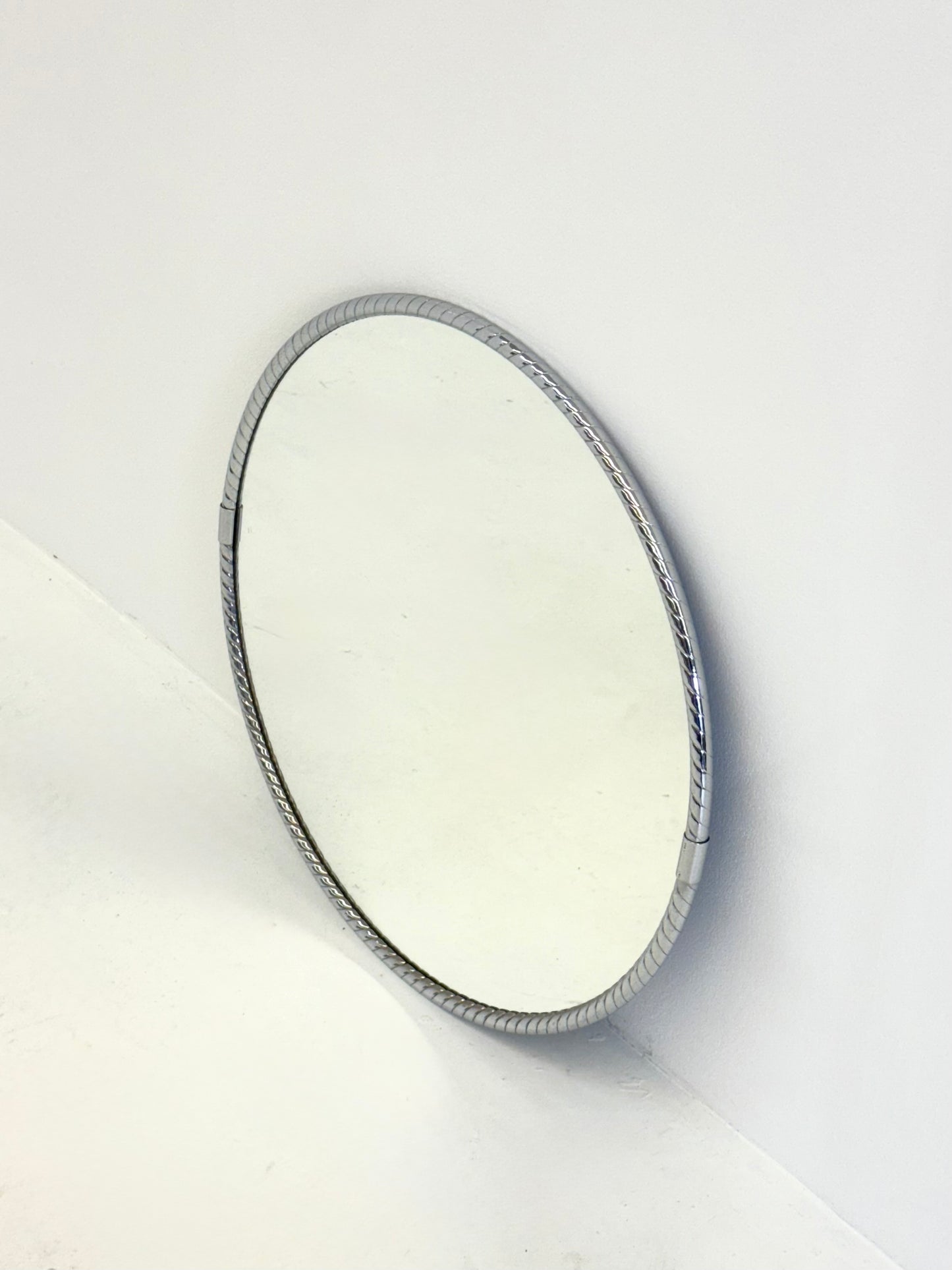 Vintage ronde spiegel met minimalistisch buisframe