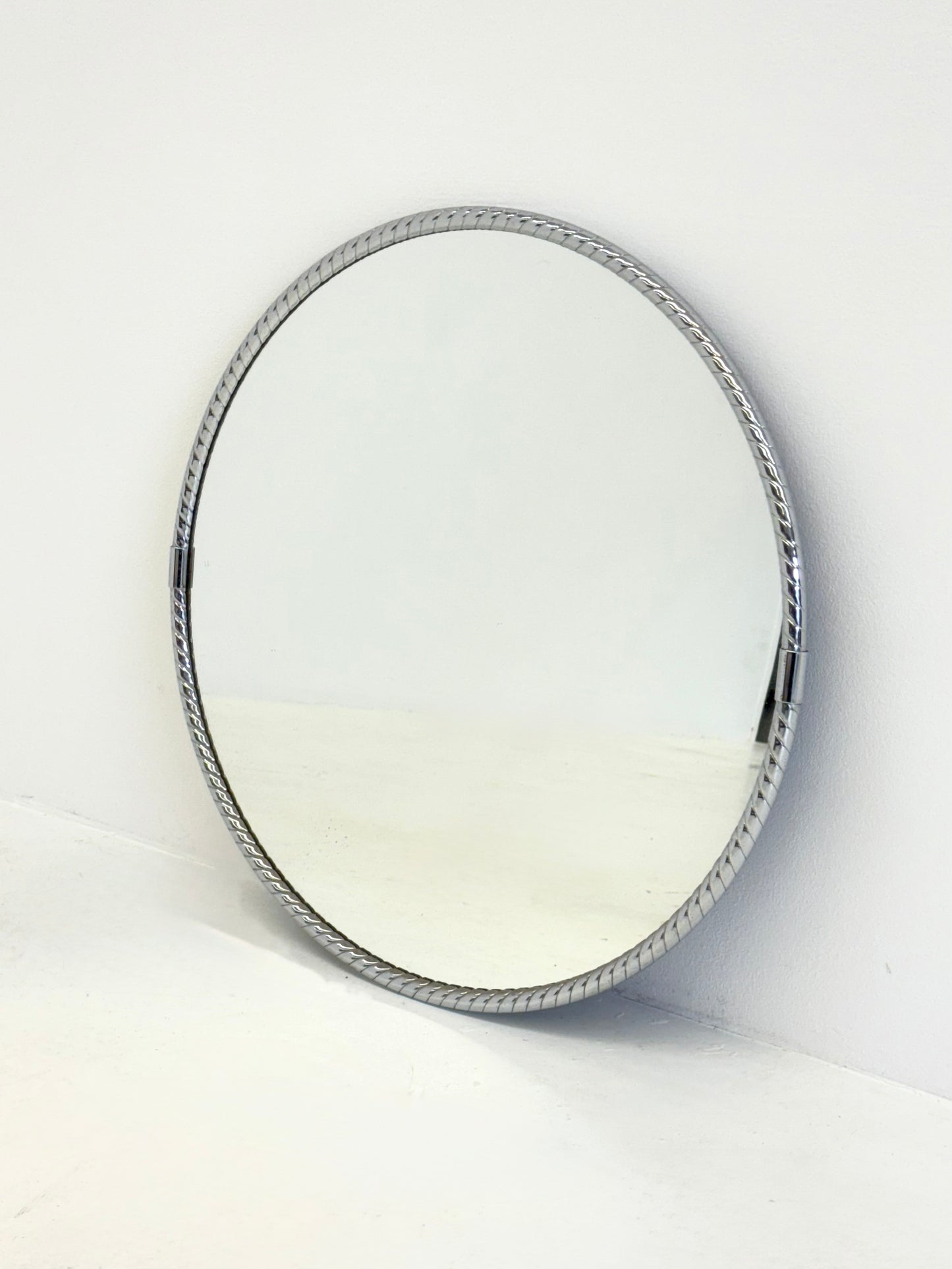 Vintage ronde spiegel met minimalistisch buisframe