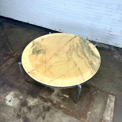 Coffee table made of marble and stainless steel