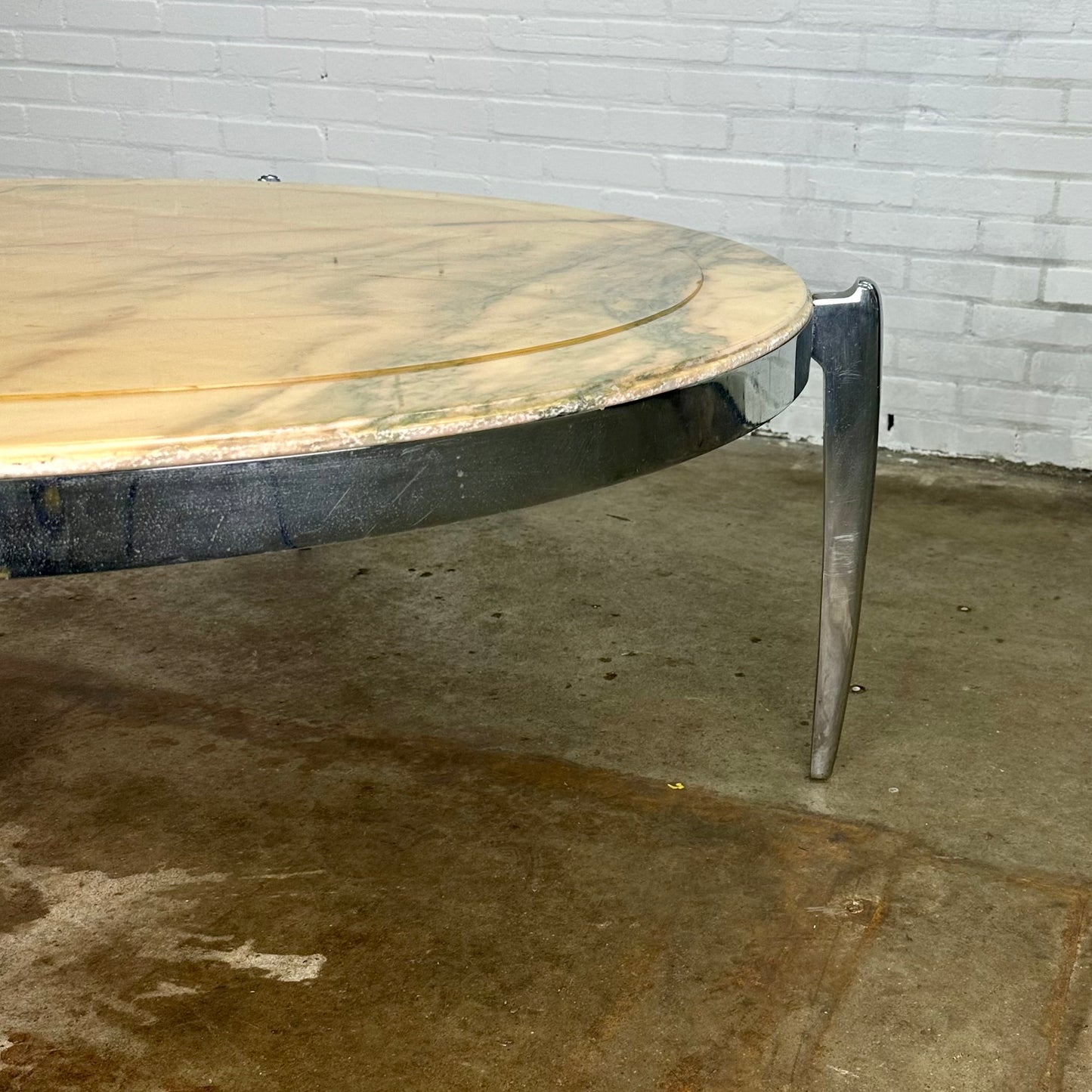 Coffee table made of marble and stainless steel