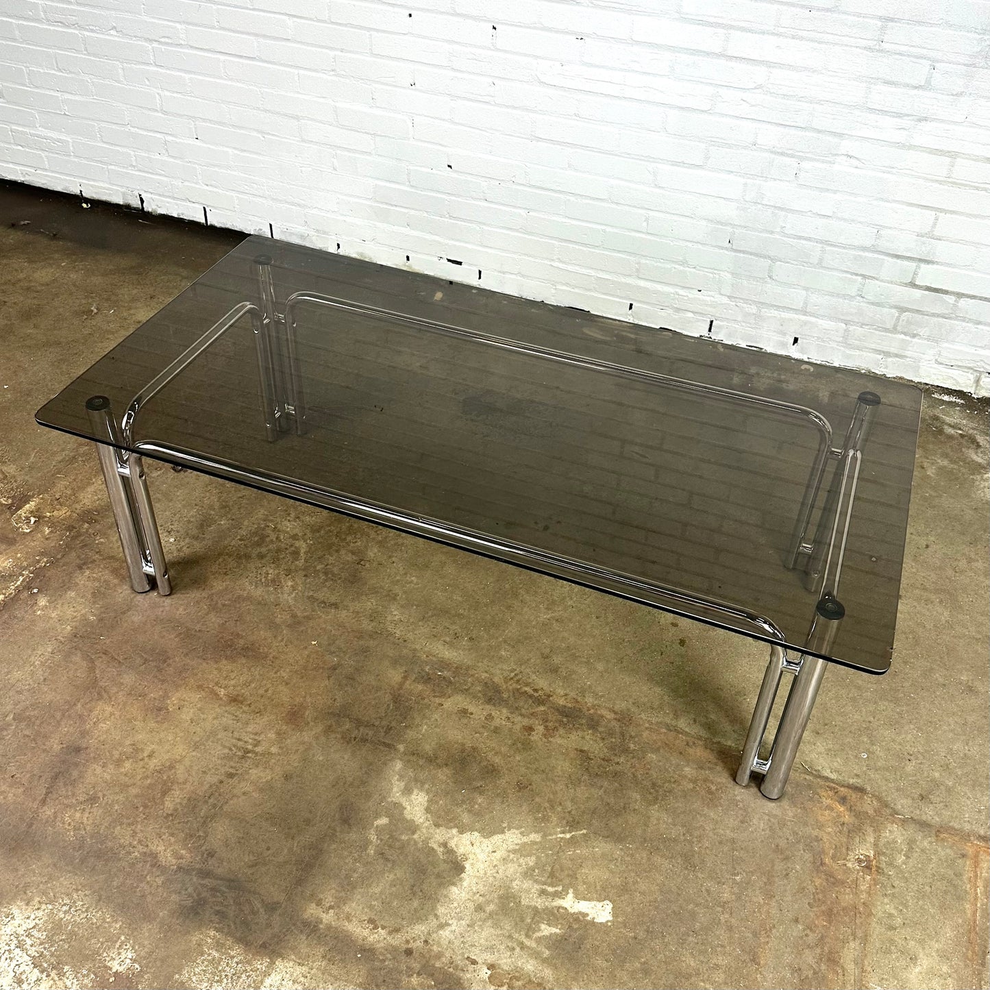 Rectangular vintage coffee table in chromed metal and smoked glass
