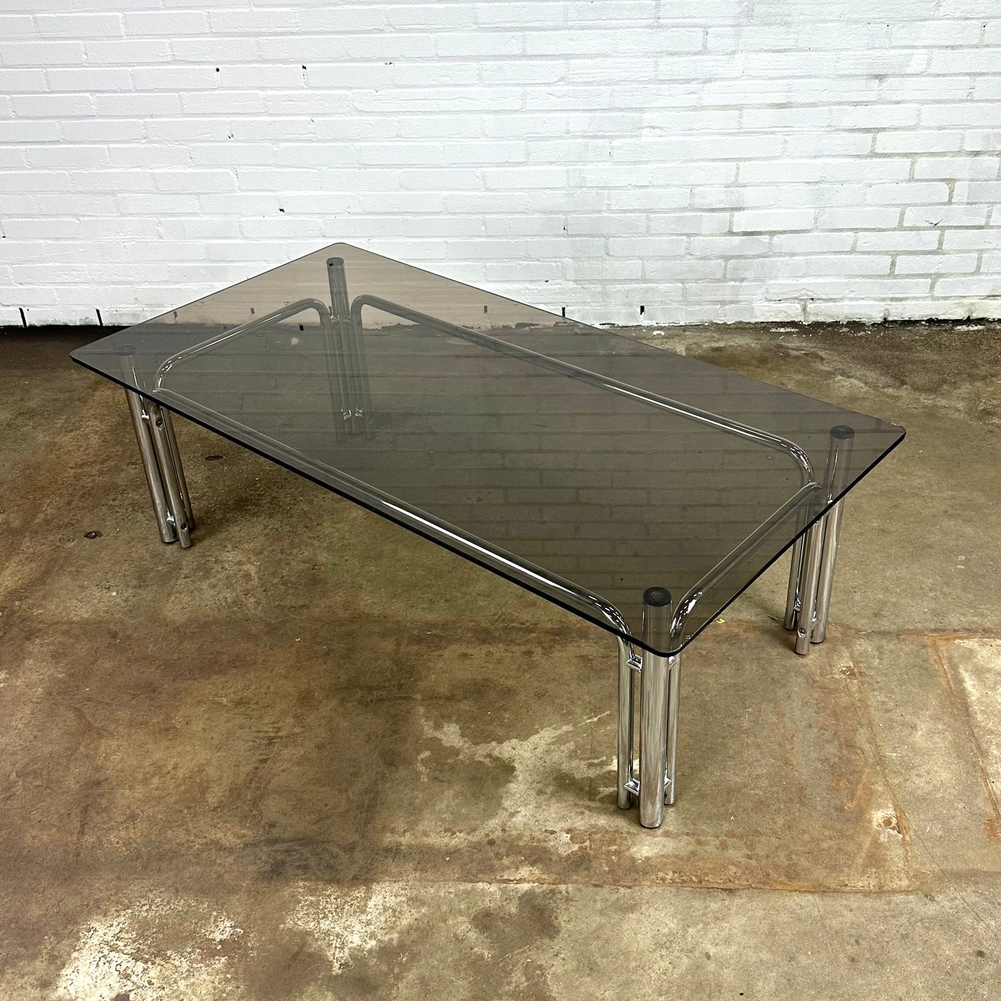 Rectangular vintage coffee table in chromed metal and smoked glass