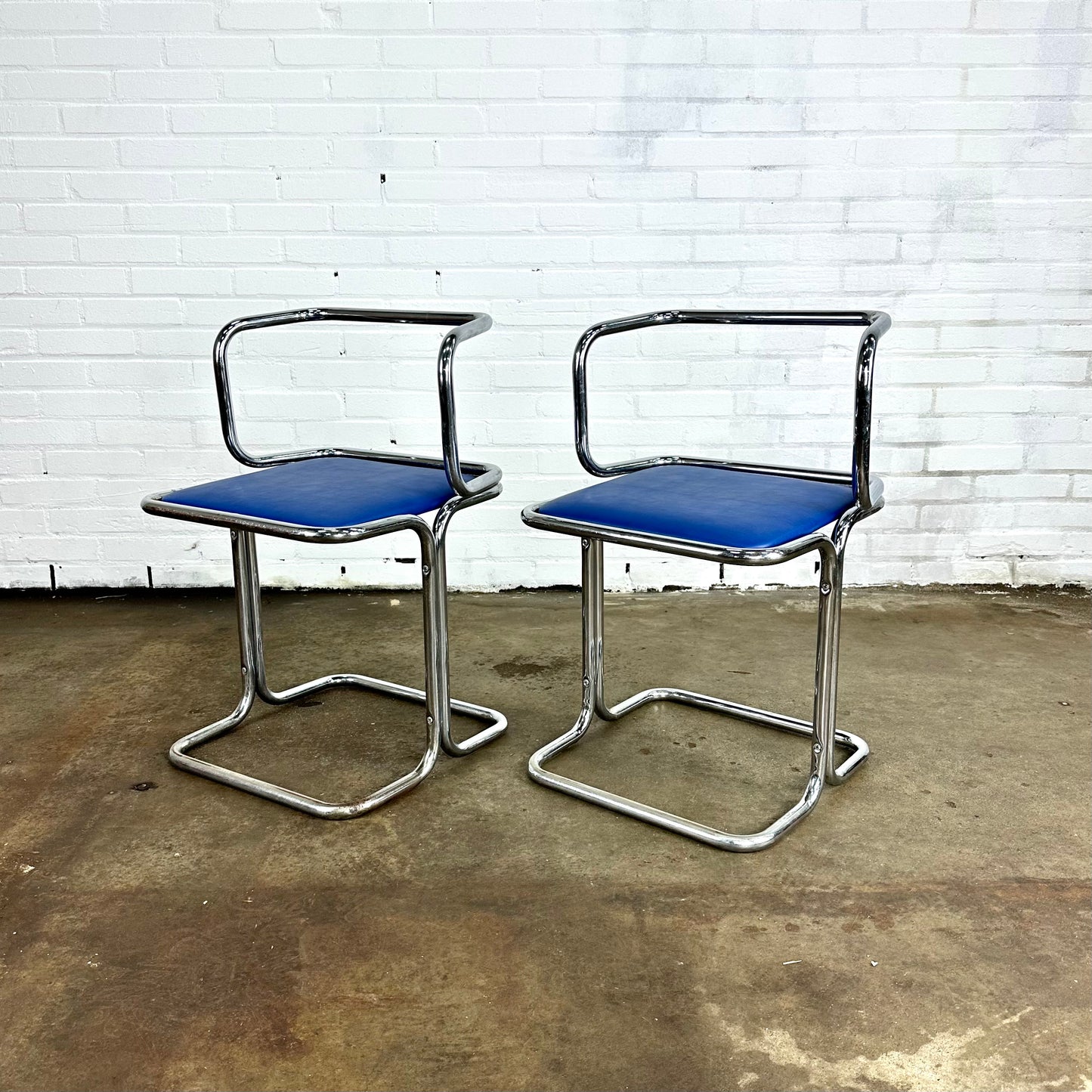 Vintage buisframe eetkamerstoelen