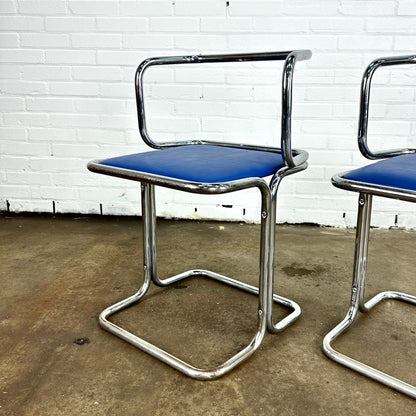 Vintage buisframe eetkamerstoelen