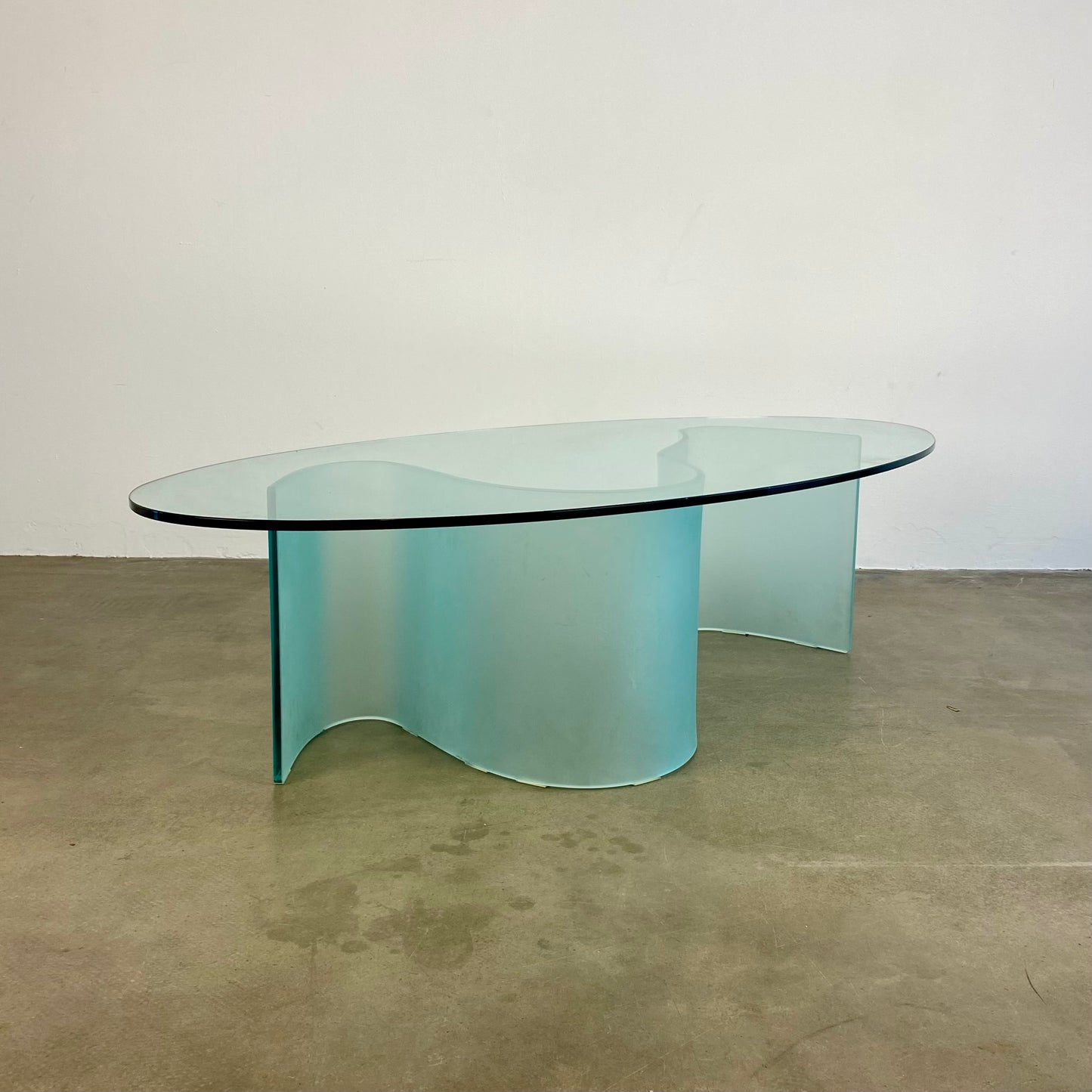 glass-coffee-table-with-wave-legs-vintage