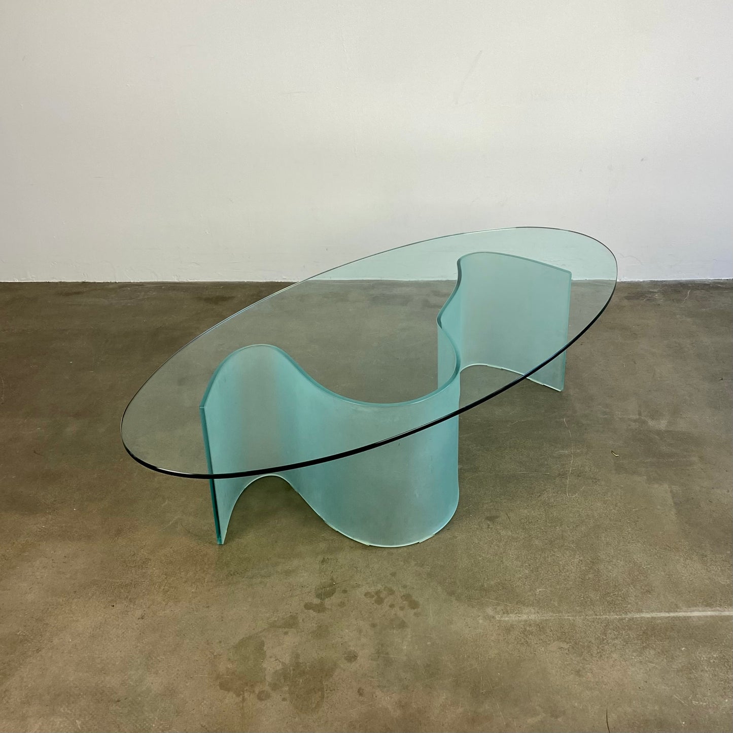 glass-coffee-table-with-wave-legs-vintage