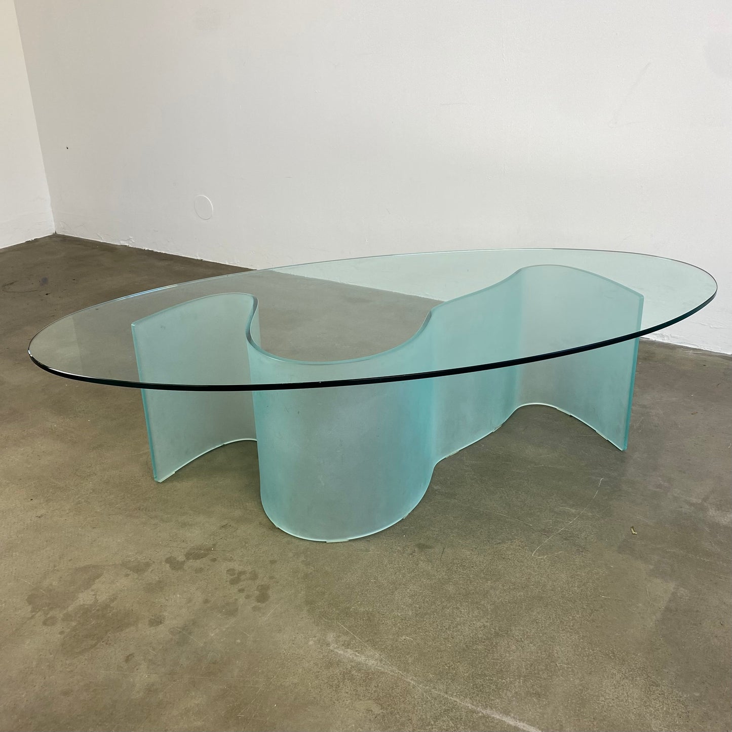 glass-coffee-table-with-wave-legs-vintage