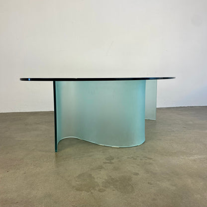 Glass coffee table with wave legs