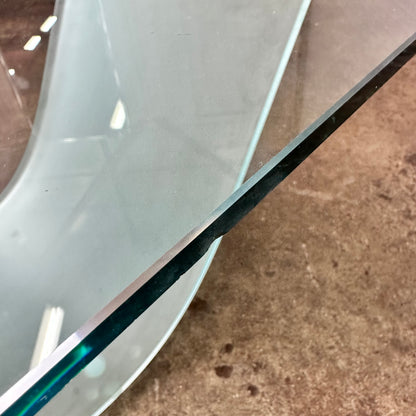 Glass coffee table with wave leg