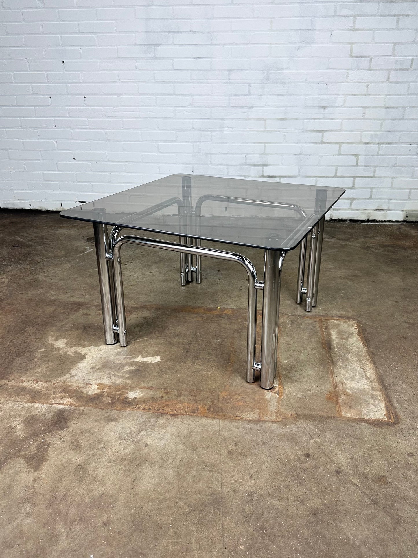 Vintage coffee table in chromed metal and smoked glass