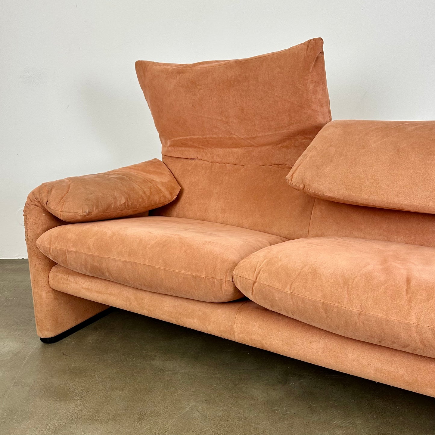 Peach Cassina Maralunga sofa by Vico Magistretti