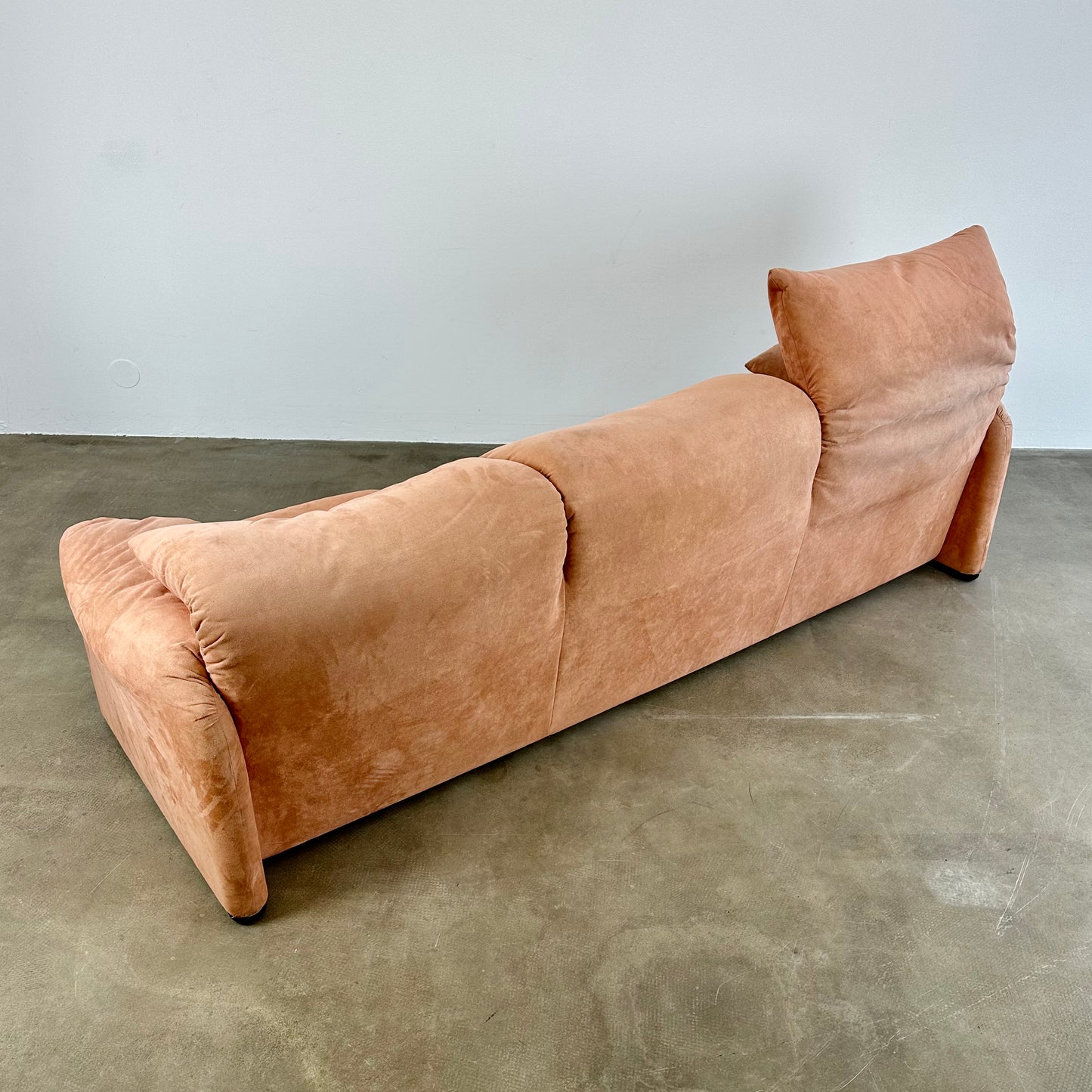 Peach Cassina Maralunga sofa by Vico Magistretti