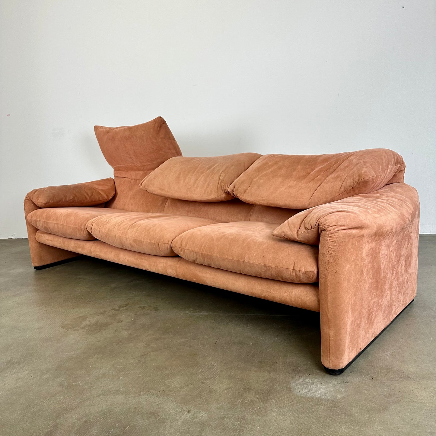 Peach Cassina Maralunga sofa by Vico Magistretti