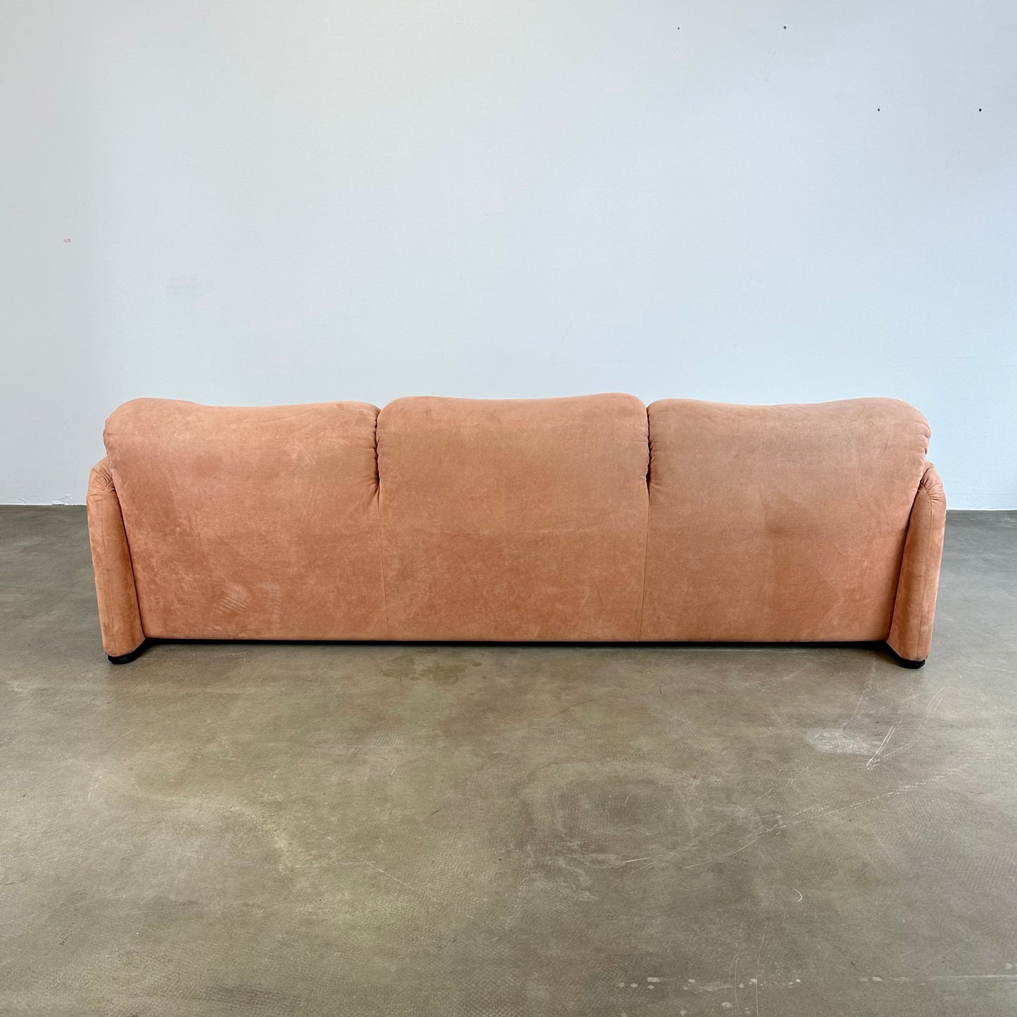 Peach Cassina Maralunga sofa by Vico Magistretti