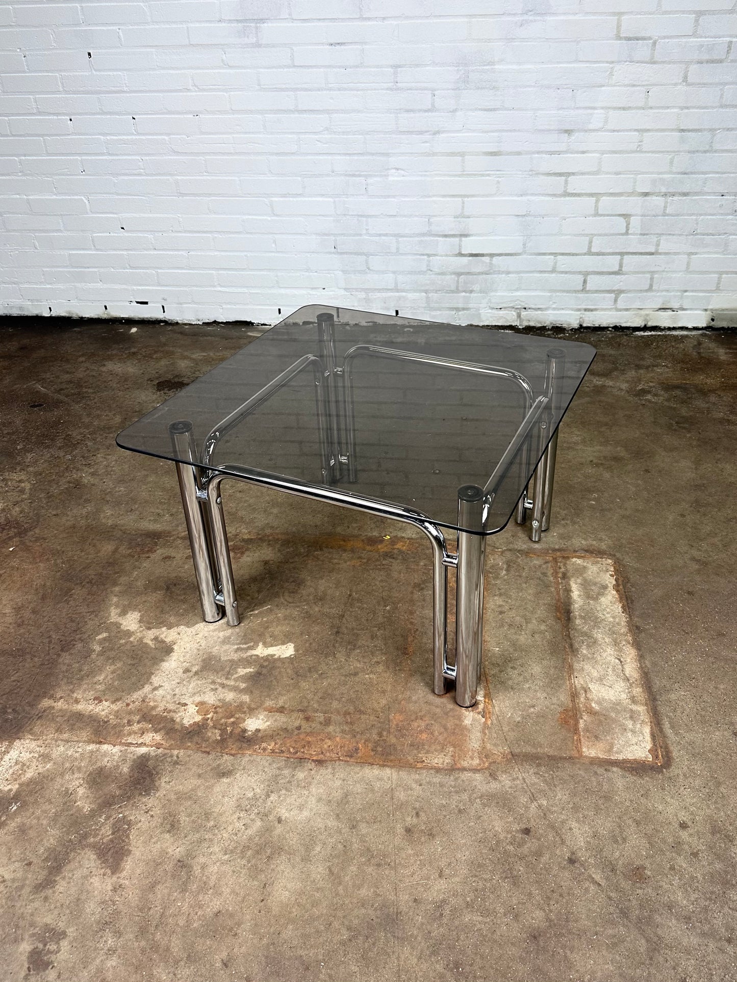 Vintage coffee table in chromed metal and smoked glass