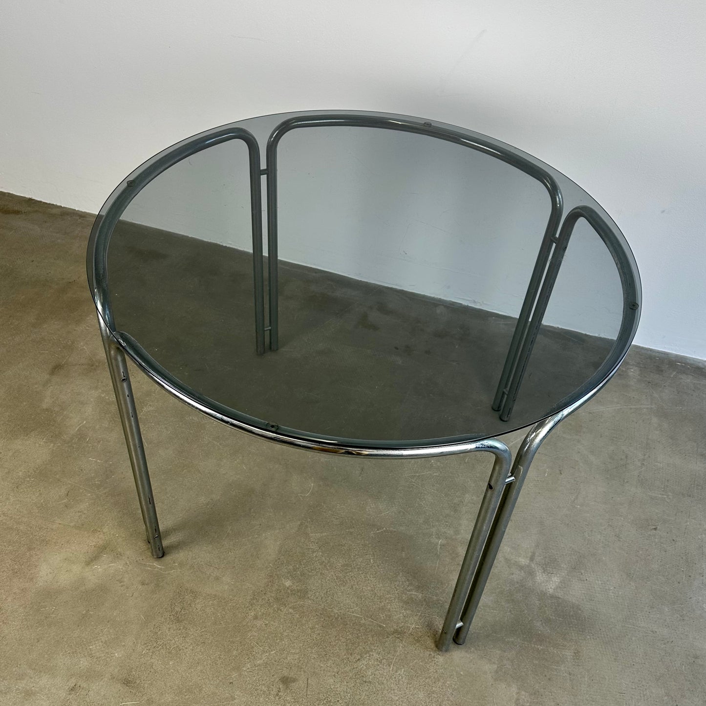 Round vintage dining table with smoke glass