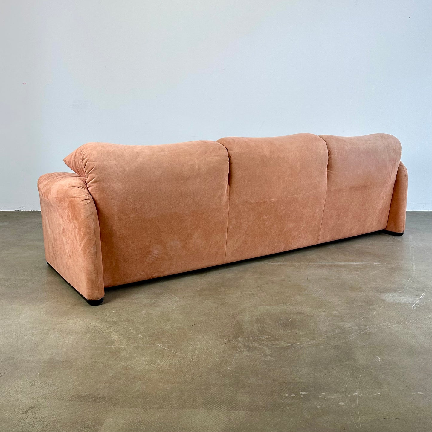 Peach Cassina Maralunga sofa by Vico Magistretti